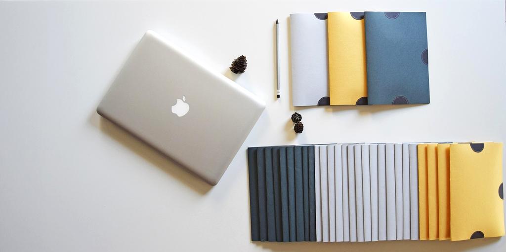 Creative team designing compelling marketing materials and visual content across multiple channels